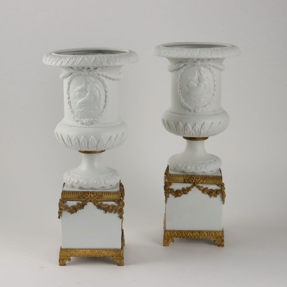 Pair of Biscuit Crater Vases