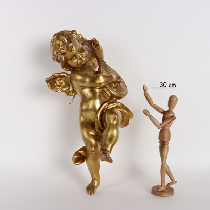 Putto Musicante in Legno Intagliato e