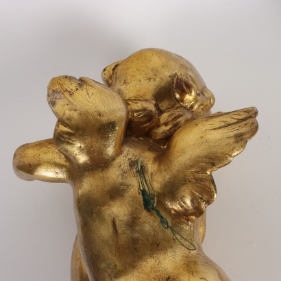 Putto Musicante in Legno Intagliato e