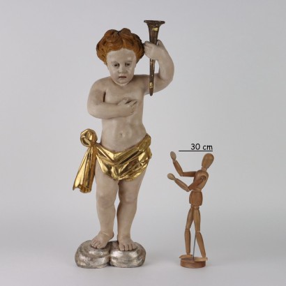 Putto tenant le flambeau