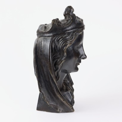 Female Face in Bronze