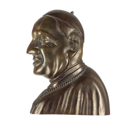 Visage du pape en bronze